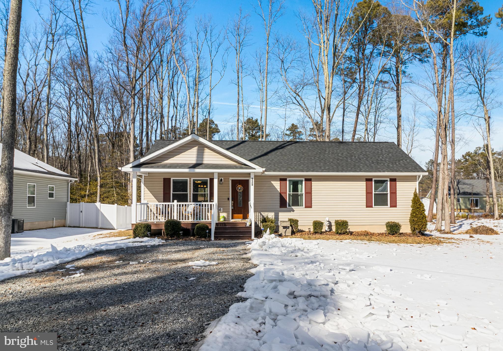 339 Azure Drive Colonial Beach, VA 22443 - Photo 2 of 28 a front view of a house with a yard