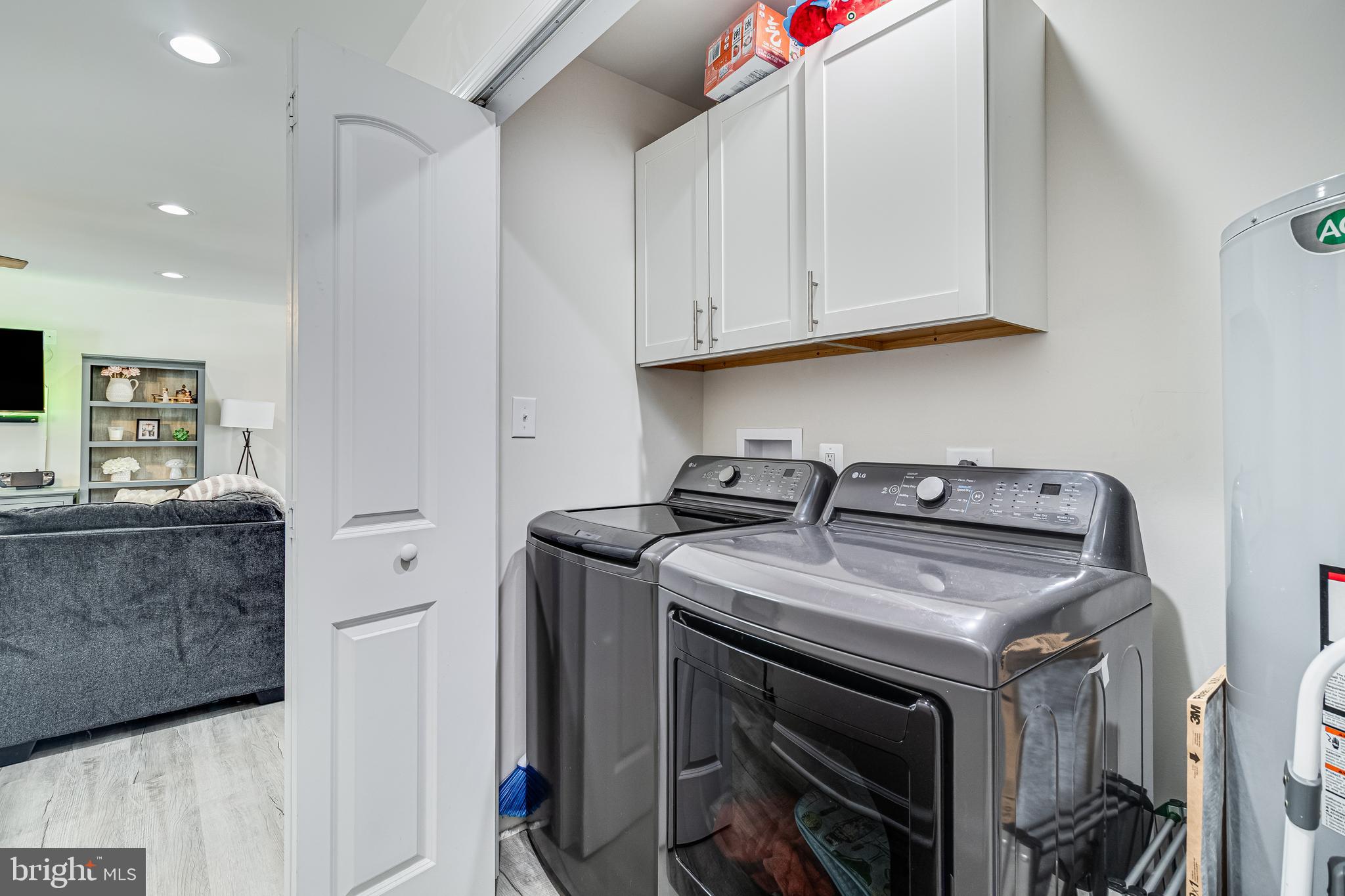 339 Azure Drive Colonial Beach, VA 22443 - Photo 22 of 28 a utility room with dryer and washer