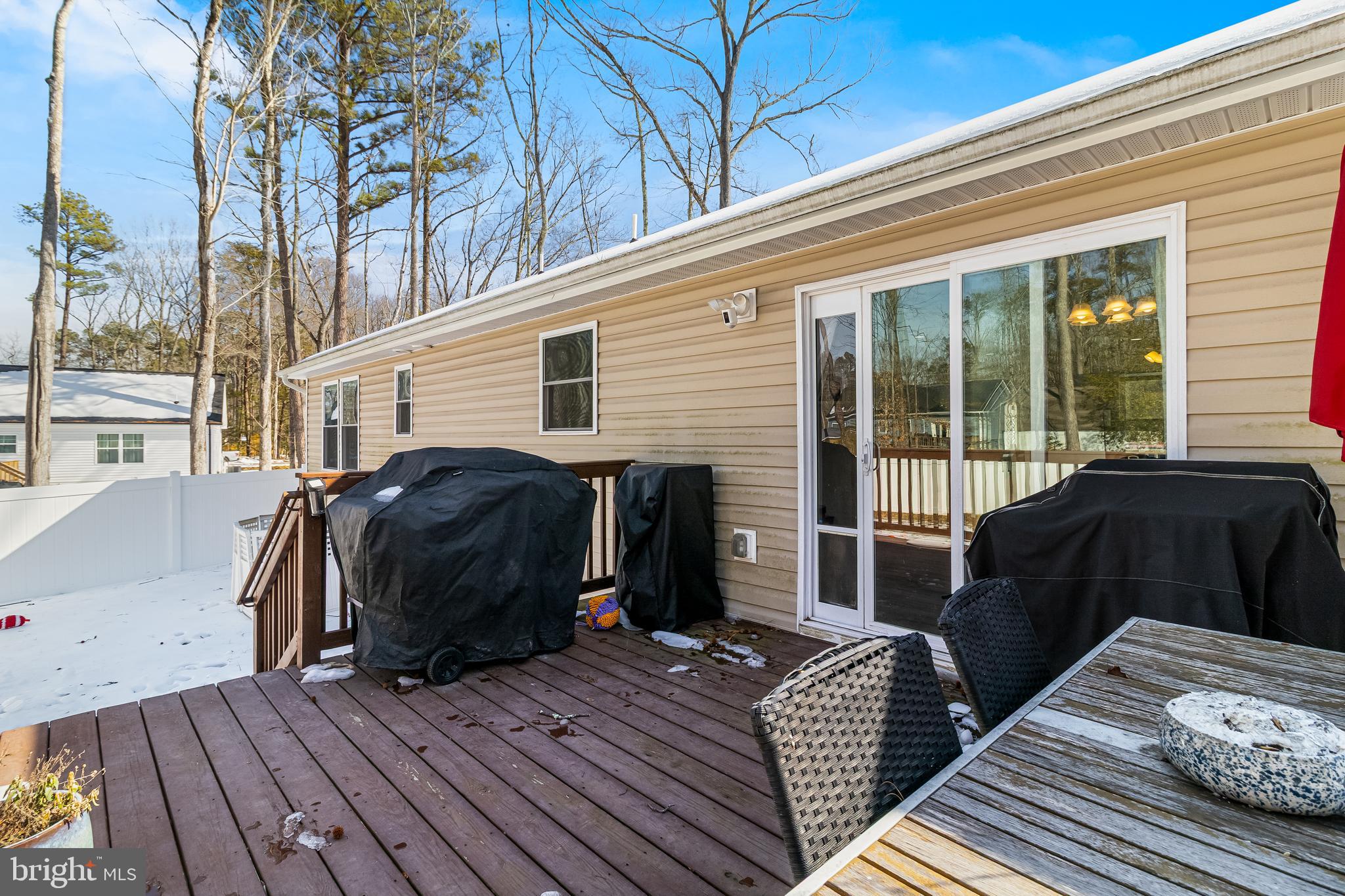 339 Azure Drive Colonial Beach, VA 22443 - Photo 24 of 28 a view of balcony with furniture and wooden floor