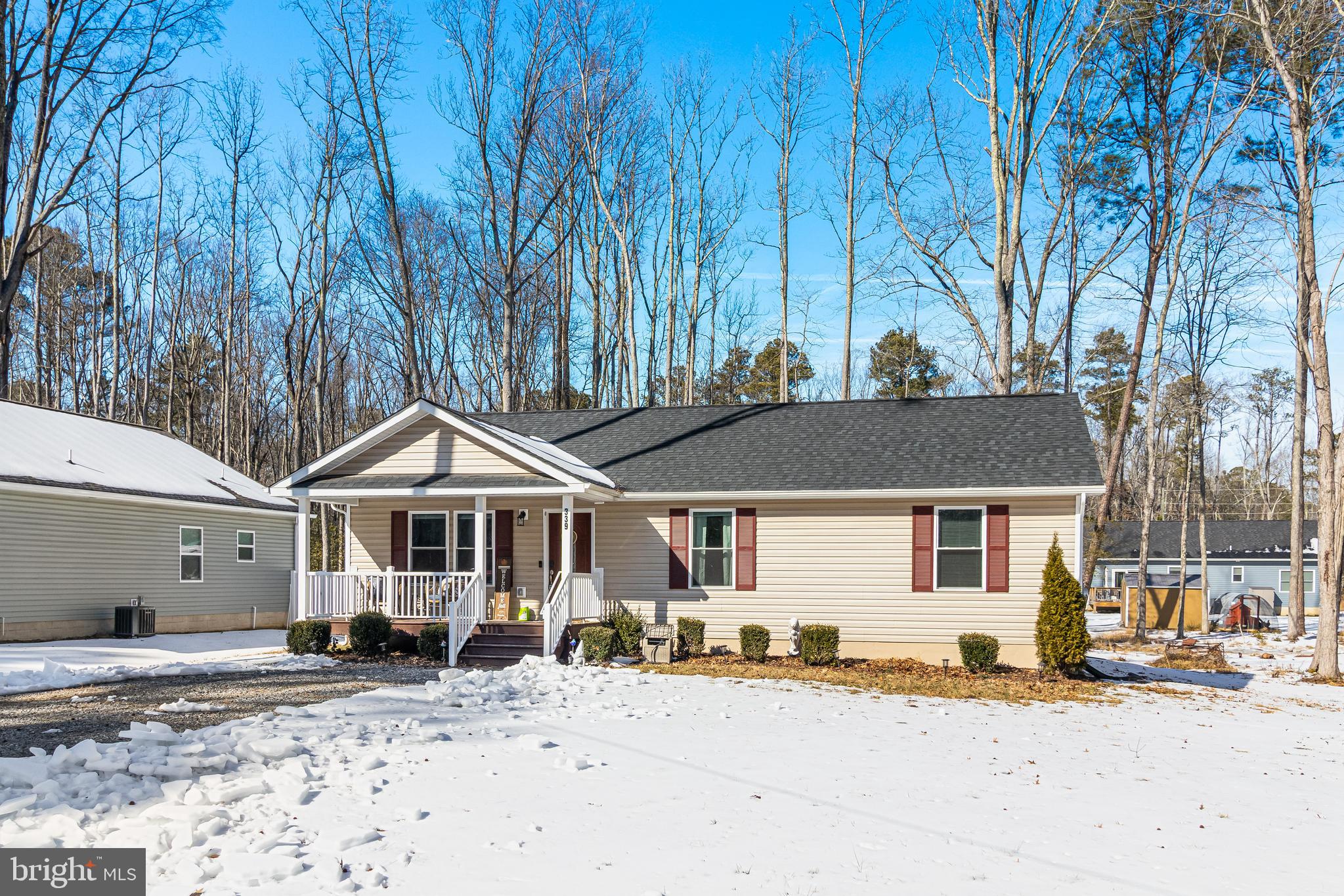 339 Azure Drive Colonial Beach, VA 22443 - Photo 3 of 28 a front view of a house with a yard