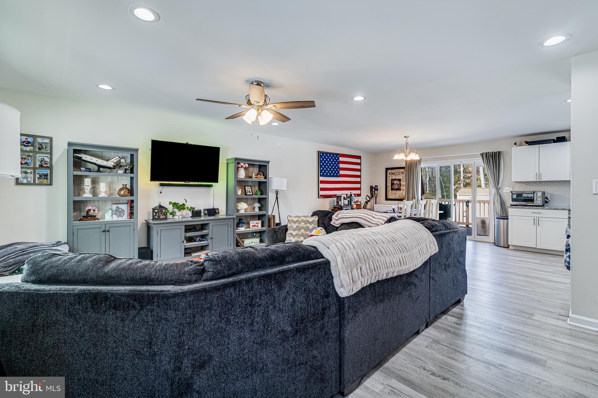 339 Azure Drive Colonial Beach, VA 22443 - Photo 5 of 28 a living room with furniture and a flat screen tv