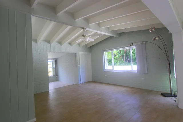 a view of livingroom with window and hardwood floor