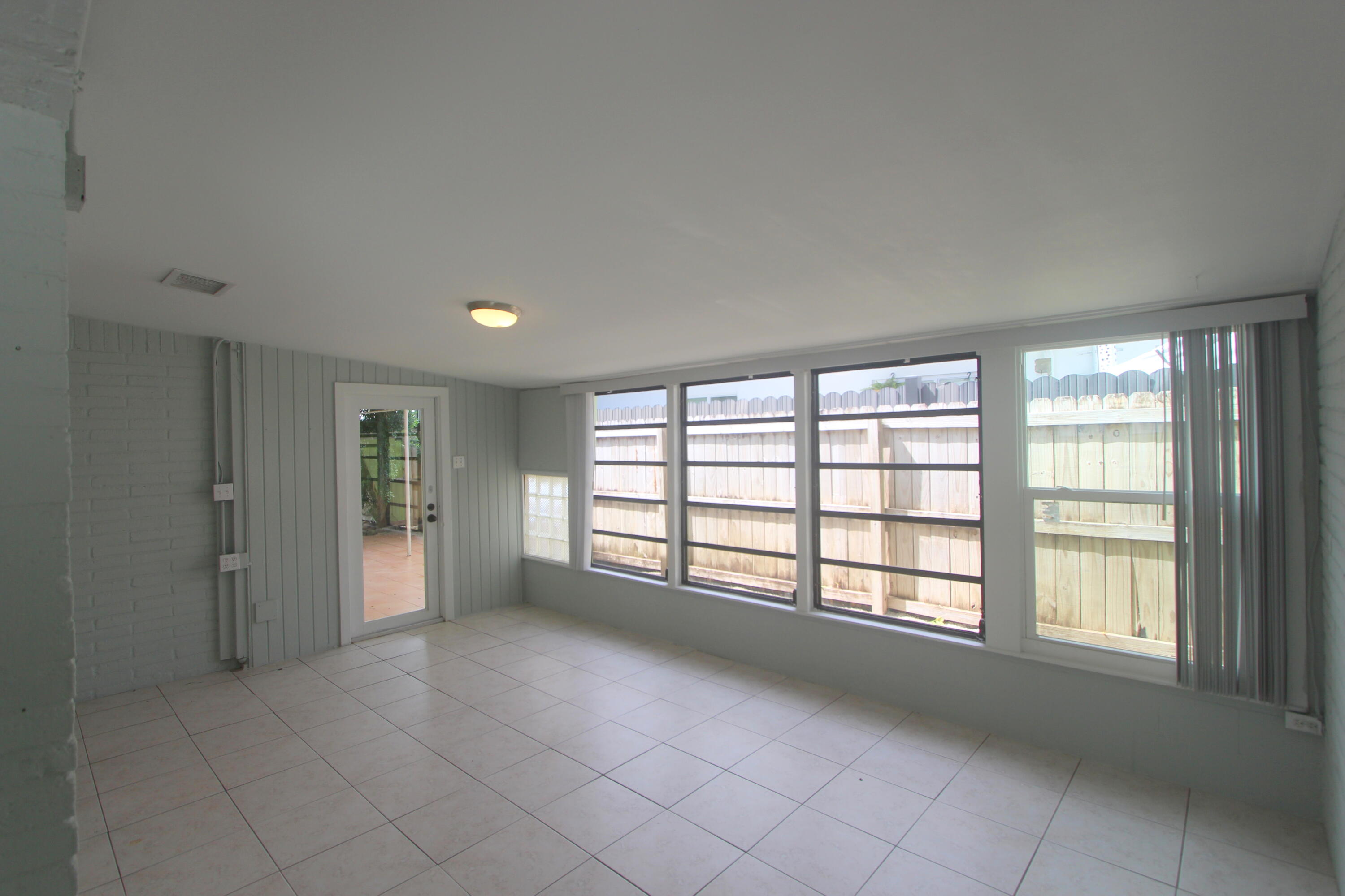 39 Bass Avenue Key Largo, FL 33037 - Photo 10 of 22 a view of an empty room with a window