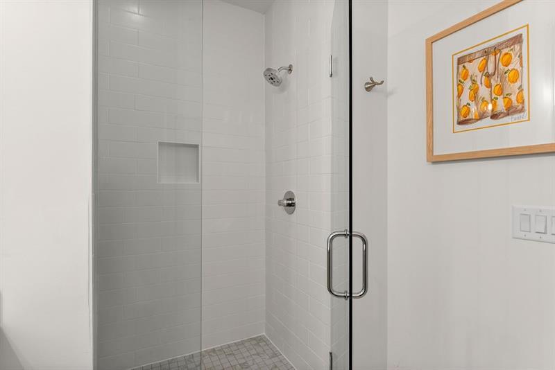 1256 Chelsea Circle Northwest Atlanta, GA 30318 - Photo 25 of 52 a bathroom with a shower