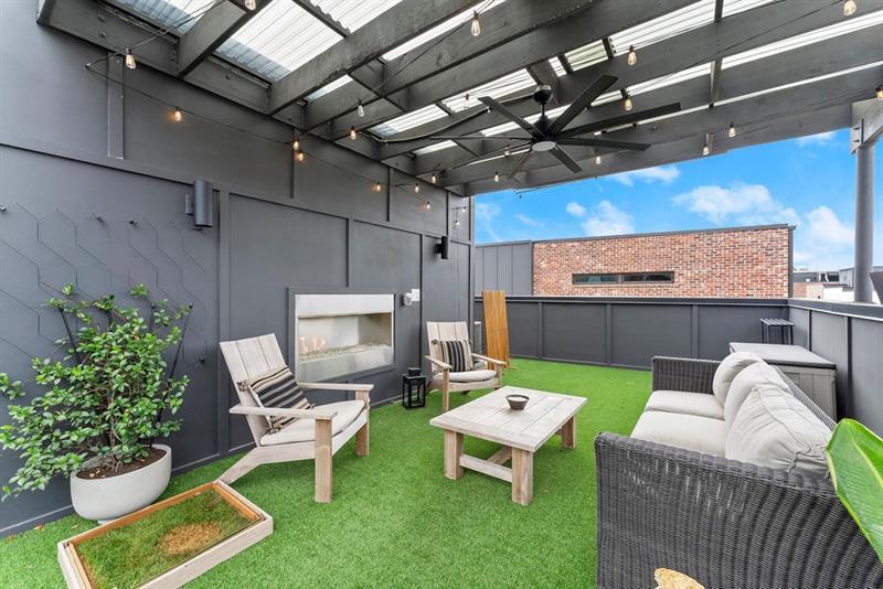 1256 Chelsea Circle Northwest Atlanta, GA 30318 - Photo 33 of 52 a work room with furniture and a potted plant