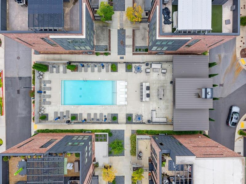 1256 Chelsea Circle Northwest Atlanta, GA 30318 - Photo 51 of 52 a view of building with an outdoor space and seating area