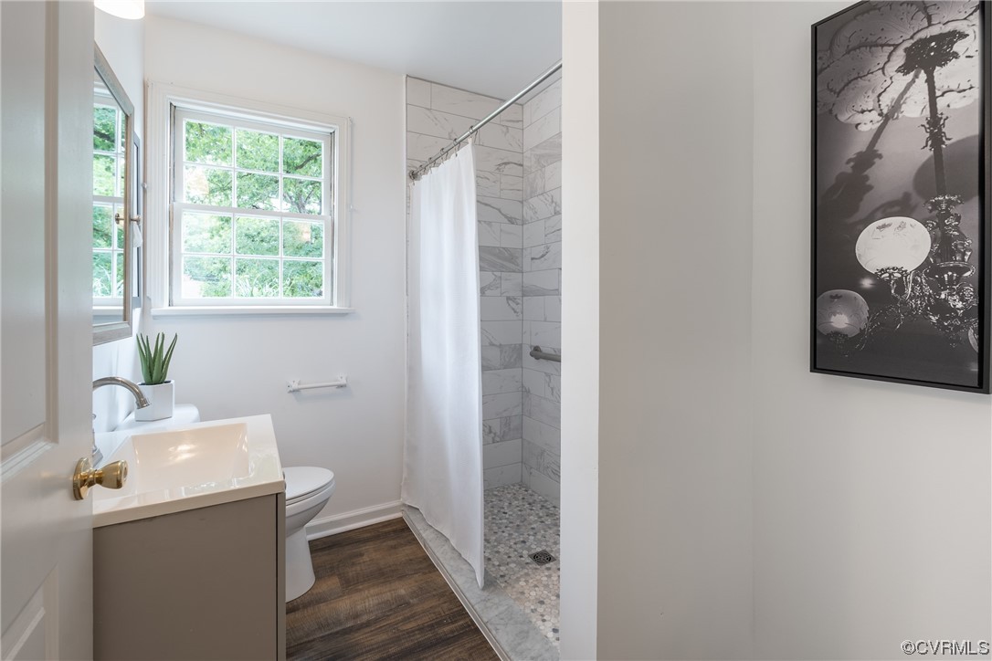 9004 Penguin Road Henrico, VA 23229 - Photo 24 of 42 Renovated bathroom with ceramic tiled shower.