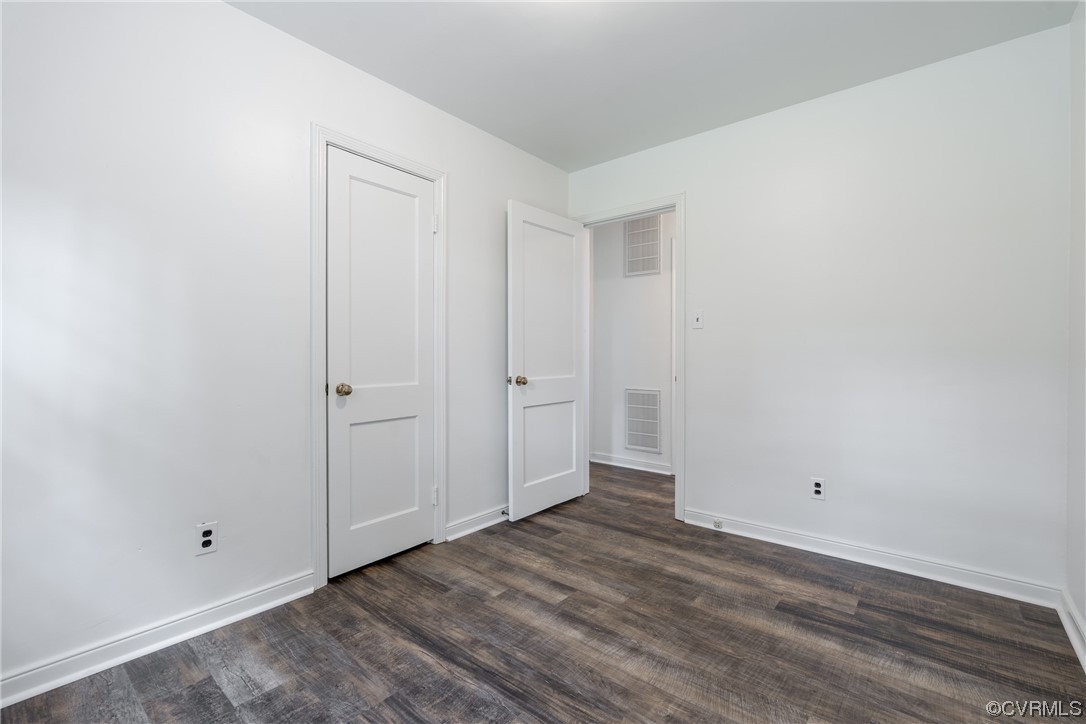 9004 Penguin Road Henrico, VA 23229 - Photo 25 of 42 Rear bedroom with new LVT & paint.