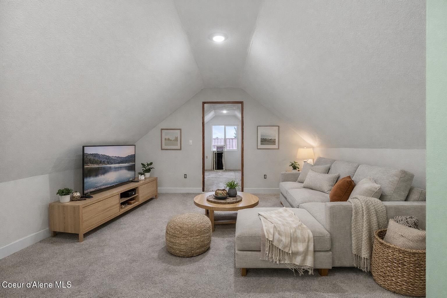 2874 East Hudlow Road Hayden, ID 83835 - Photo 25 of 52 Cozy attic TV lounge with art