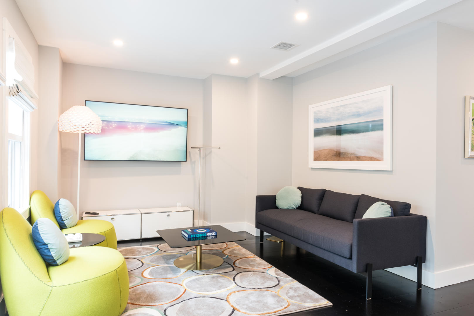 59 Orange Street Nantucket, MA 02554 - Photo 12 of 42 a living room with furniture and a flat screen tv