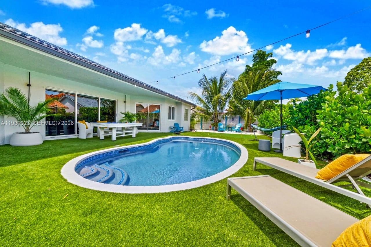 14481 Southwest 161 Street Miami, FL 33177 - Photo 3 of 24 a view of swimming pool with outdoor seating