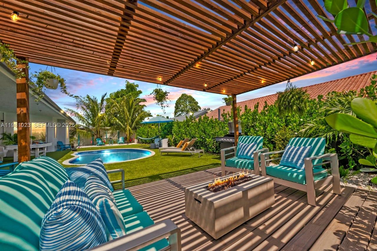 14481 Southwest 161 Street Miami, FL 33177 - Photo 4 of 24 a view of a backyard with sitting area