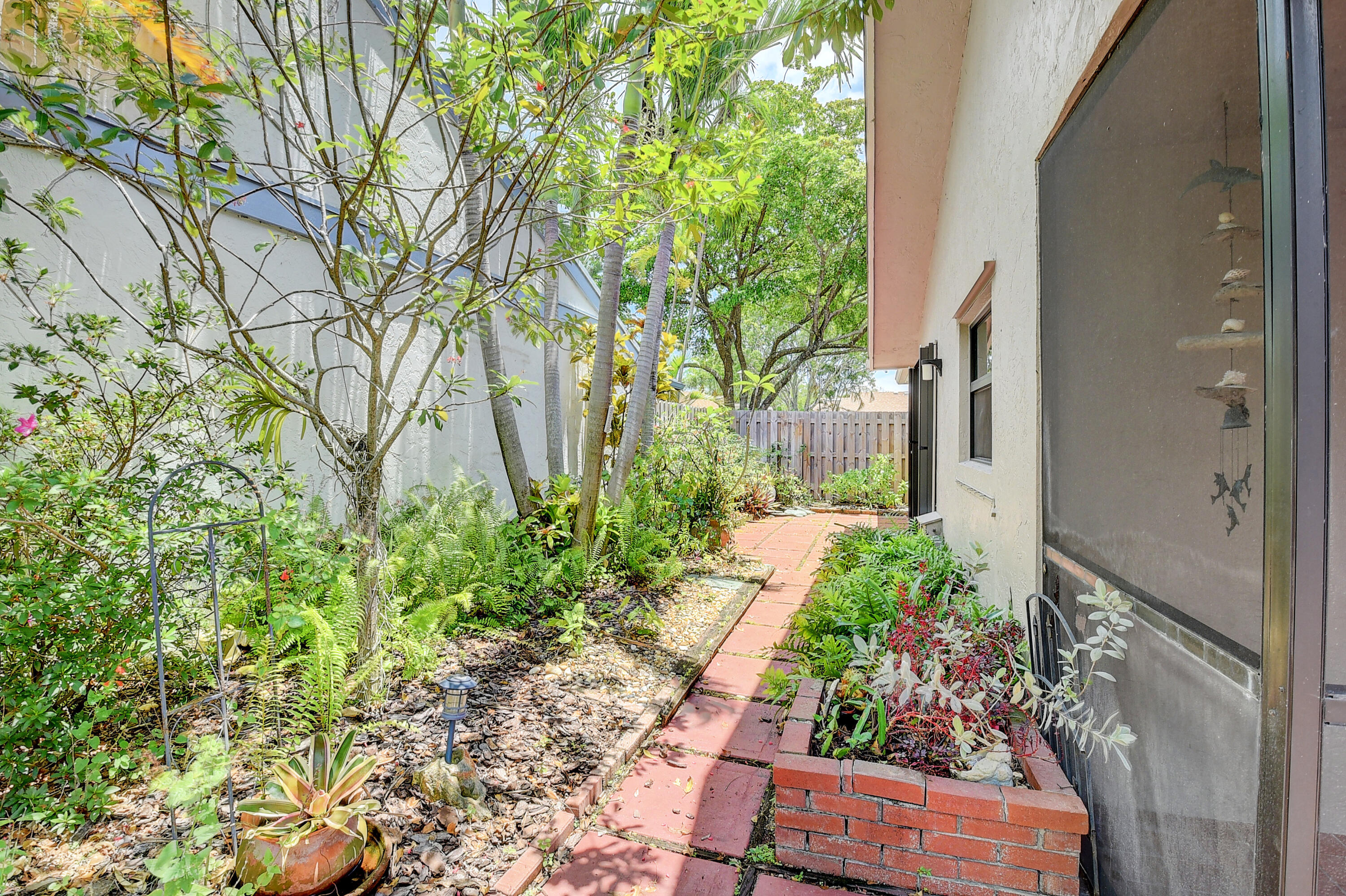 9 Baytree Circle Boynton Beach, FL 33436 - Photo 28 of 40 Side Patio