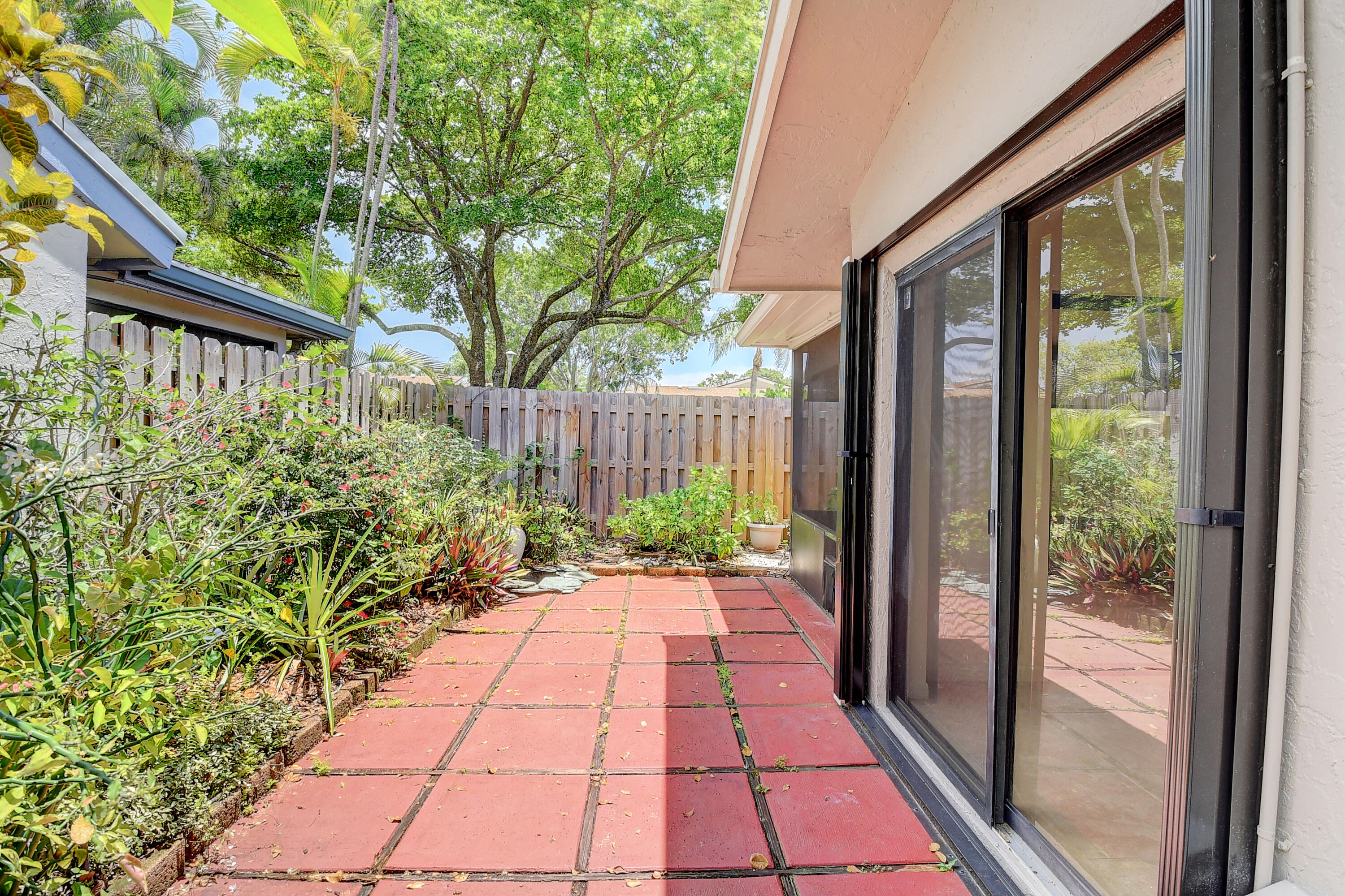 9 Baytree Circle Boynton Beach, FL 33436 - Photo 29 of 40 Side Patio