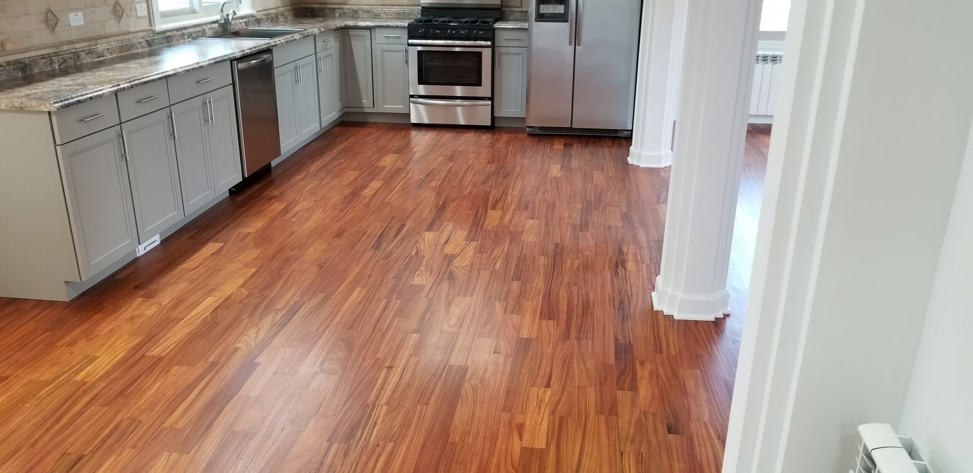 3750 West Dupont Road Morris, IL 60450 - Photo 9 of 26 a view of a kitchen with wooden floor and electronic appliances