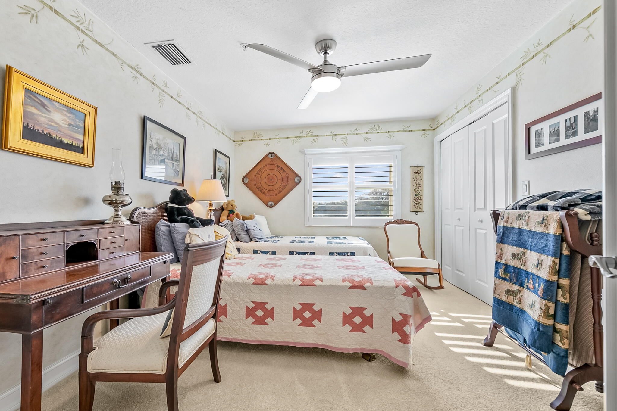 29 Riverside Drive, Unit 401 Cocoa, FL 32922 - Photo 14 of 41 a bedroom with a bed a flat screen tv and dresser