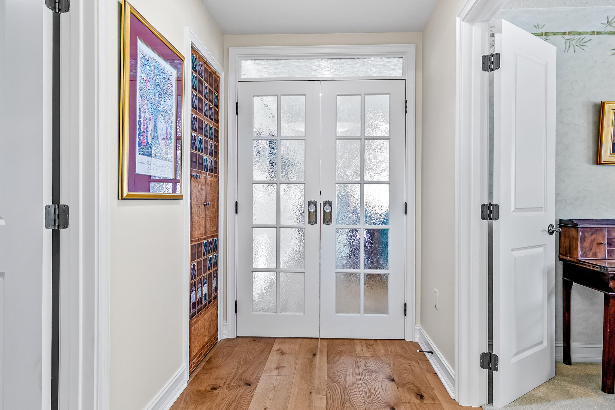 29 Riverside Drive, Unit 401 Cocoa, FL 32922 - Photo 15 of 41 a view of front door with wooden floor