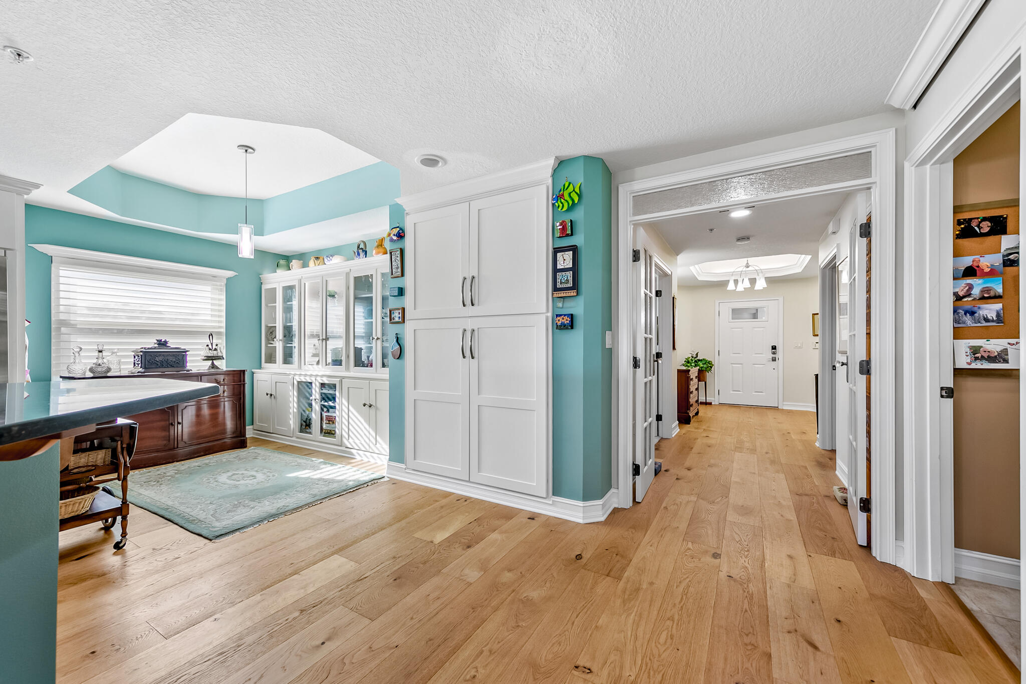29 Riverside Drive, Unit 401 Cocoa, FL 32922 - Photo 19 of 41 a view of a hallway with wooden floor and a living room