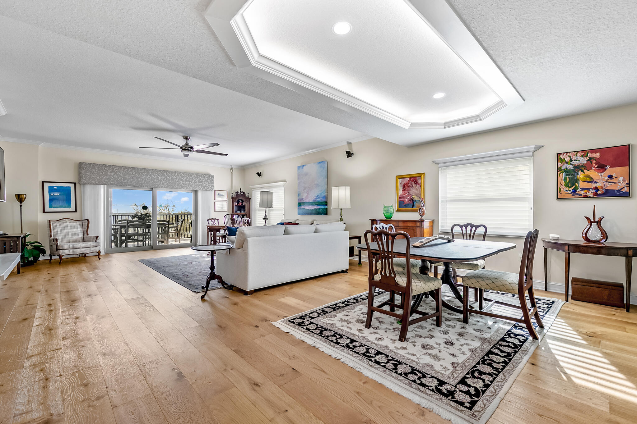 29 Riverside Drive, Unit 401 Cocoa, FL 32922 - Photo 26 of 41 a living room with furniture and a dining table