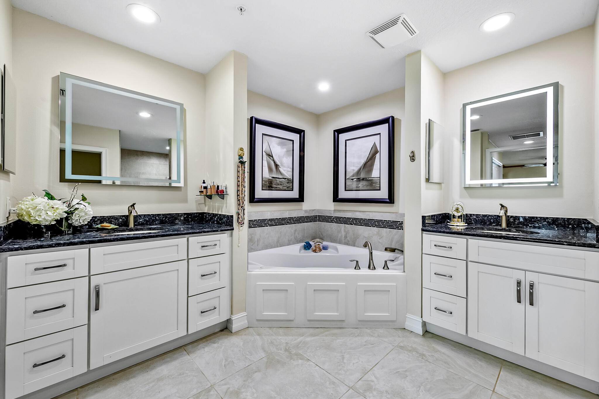 29 Riverside Drive, Unit 401 Cocoa, FL 32922 - Photo 34 of 41 a bathroom with a sink and a mirror