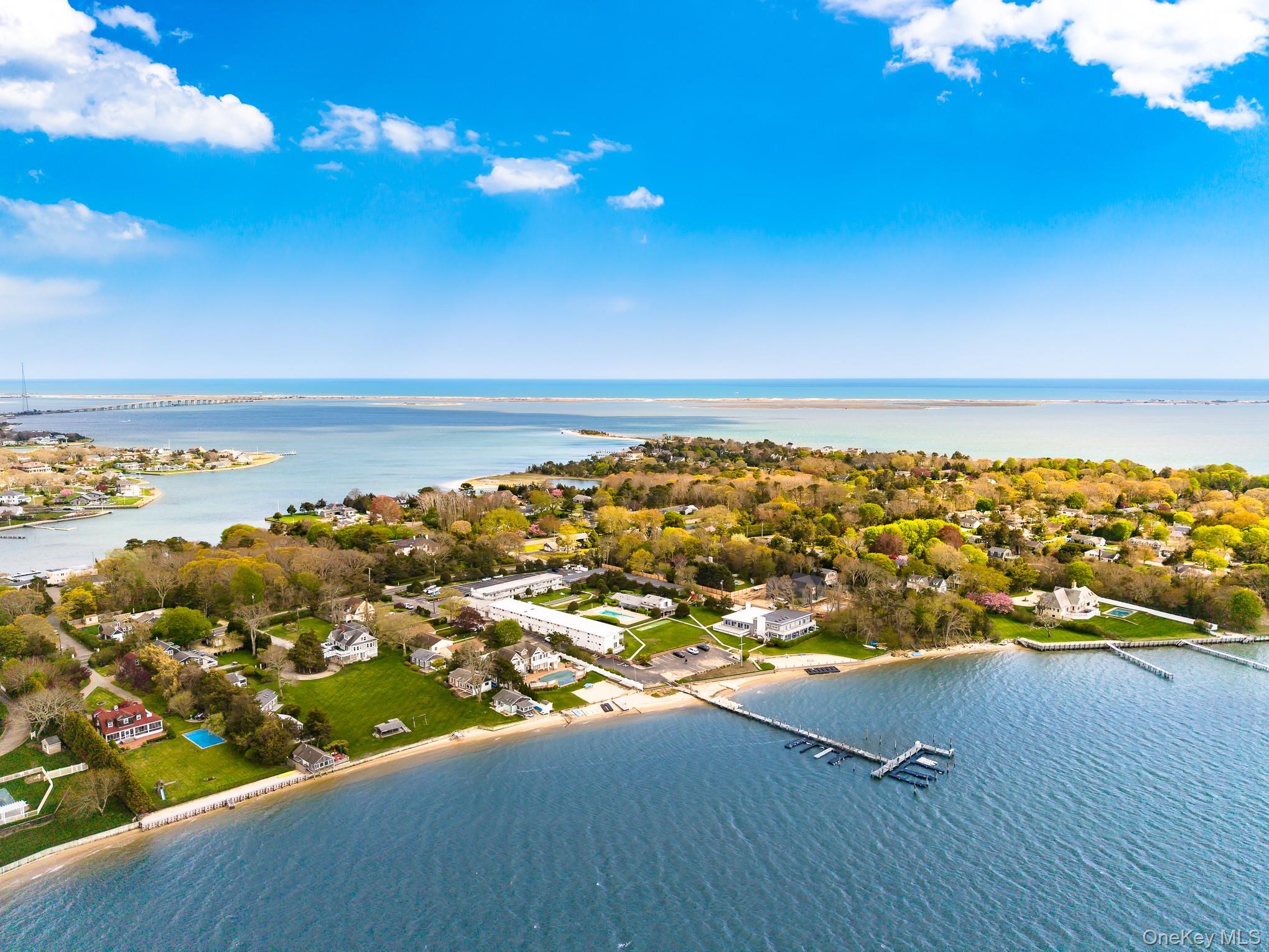 50 Rampasture Road, Unit 6 Hampton Bays, NY 11946 - Photo 6 of 35 an aerial view of beach and ocean