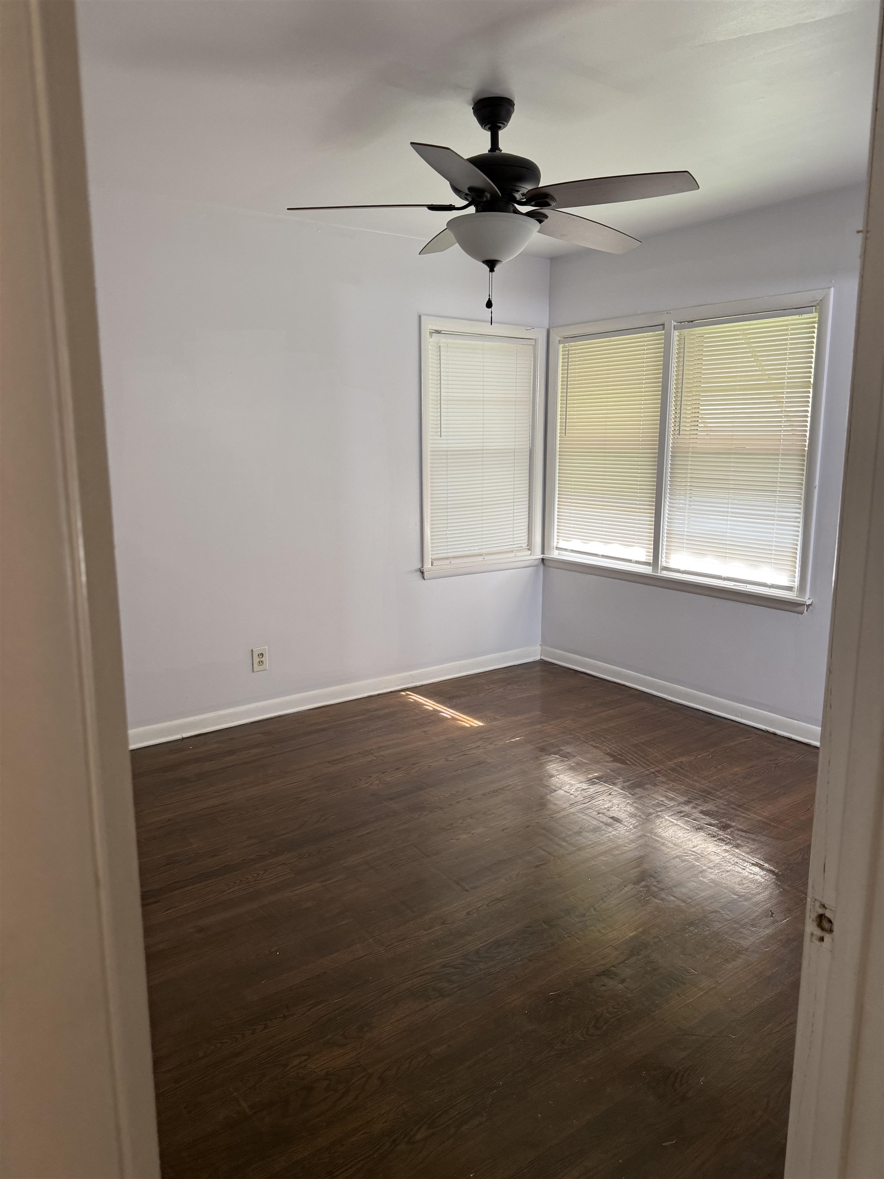 4089 Tessland Road Memphis, TN 38128 - Photo 19 of 34 Empty room featuring dark wood-style flooring and ceiling fan