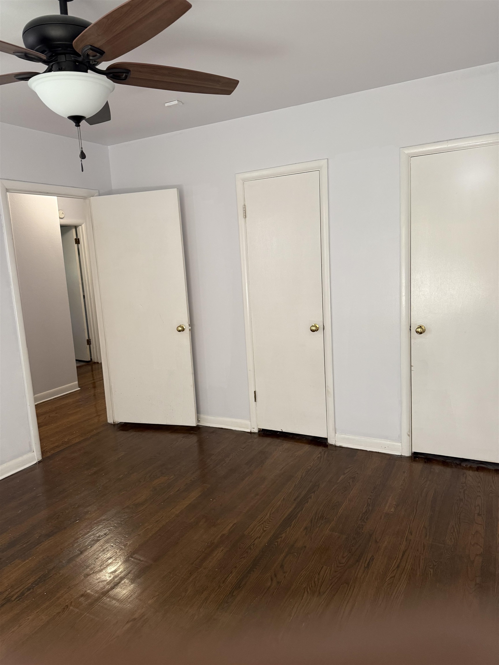 4089 Tessland Road Memphis, TN 38128 - Photo 21 of 34 Unfurnished bedroom with dark wood-style floors and a ceiling fan