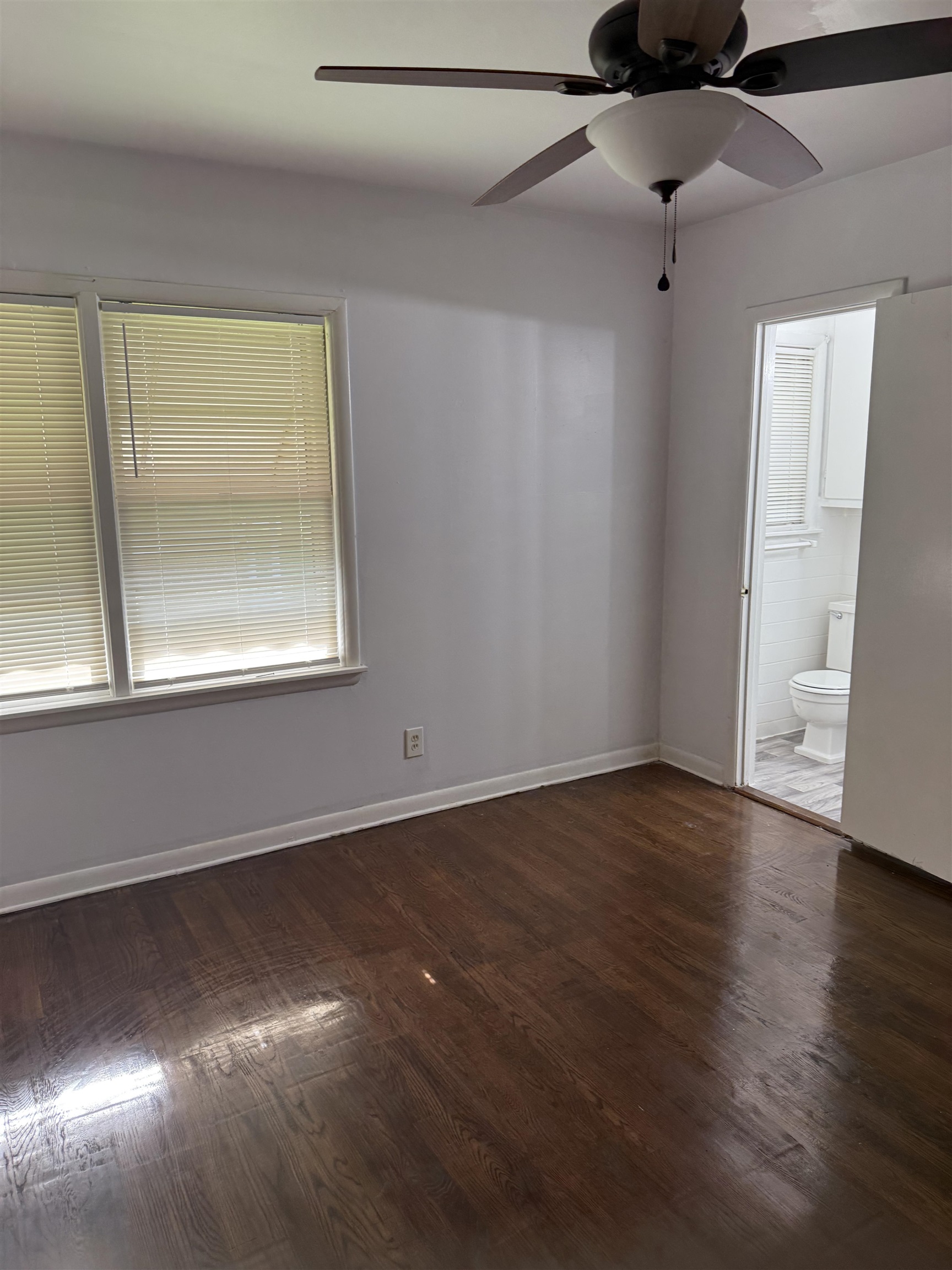 4089 Tessland Road Memphis, TN 38128 - Photo 22 of 34 Unfurnished room with a ceiling fan and wood finished floors