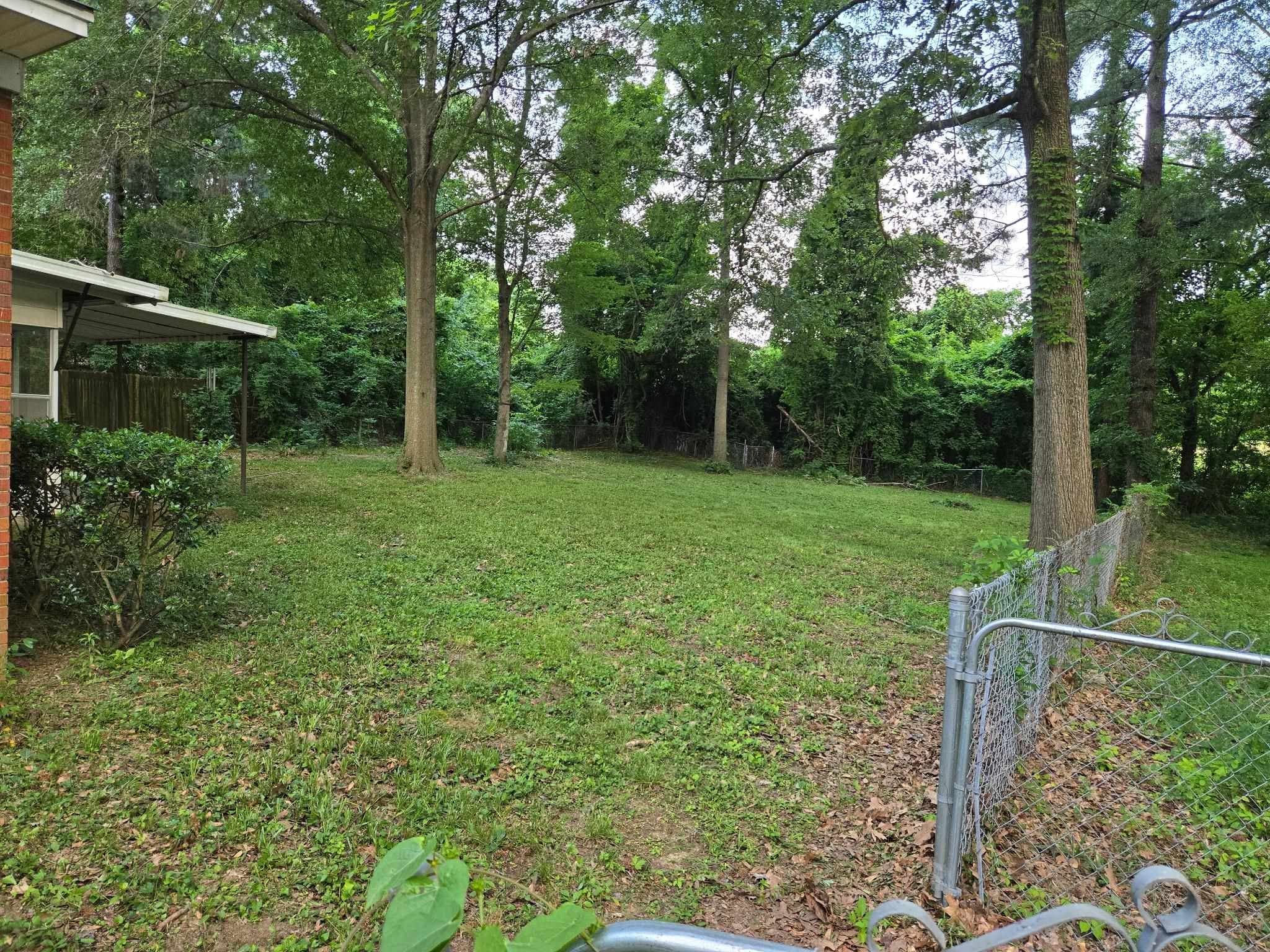 4089 Tessland Road Memphis, TN 38128 - Photo 3 of 34 View of yard featuring a gate