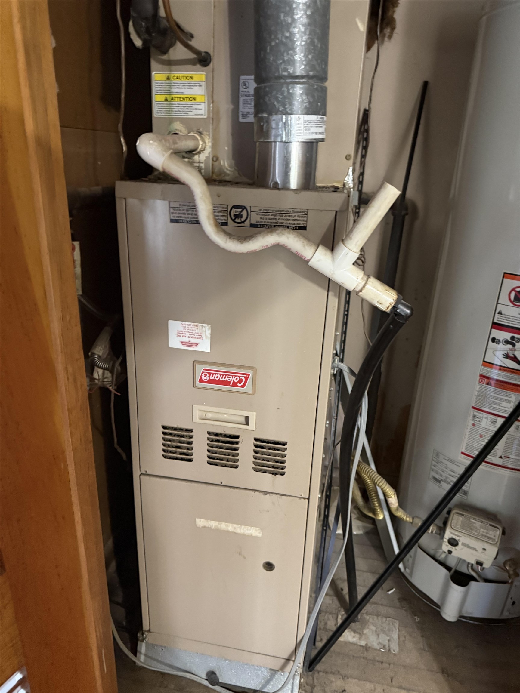 4089 Tessland Road Memphis, TN 38128 - Photo 33 of 34 Utility room featuring gas water heater and heating unit