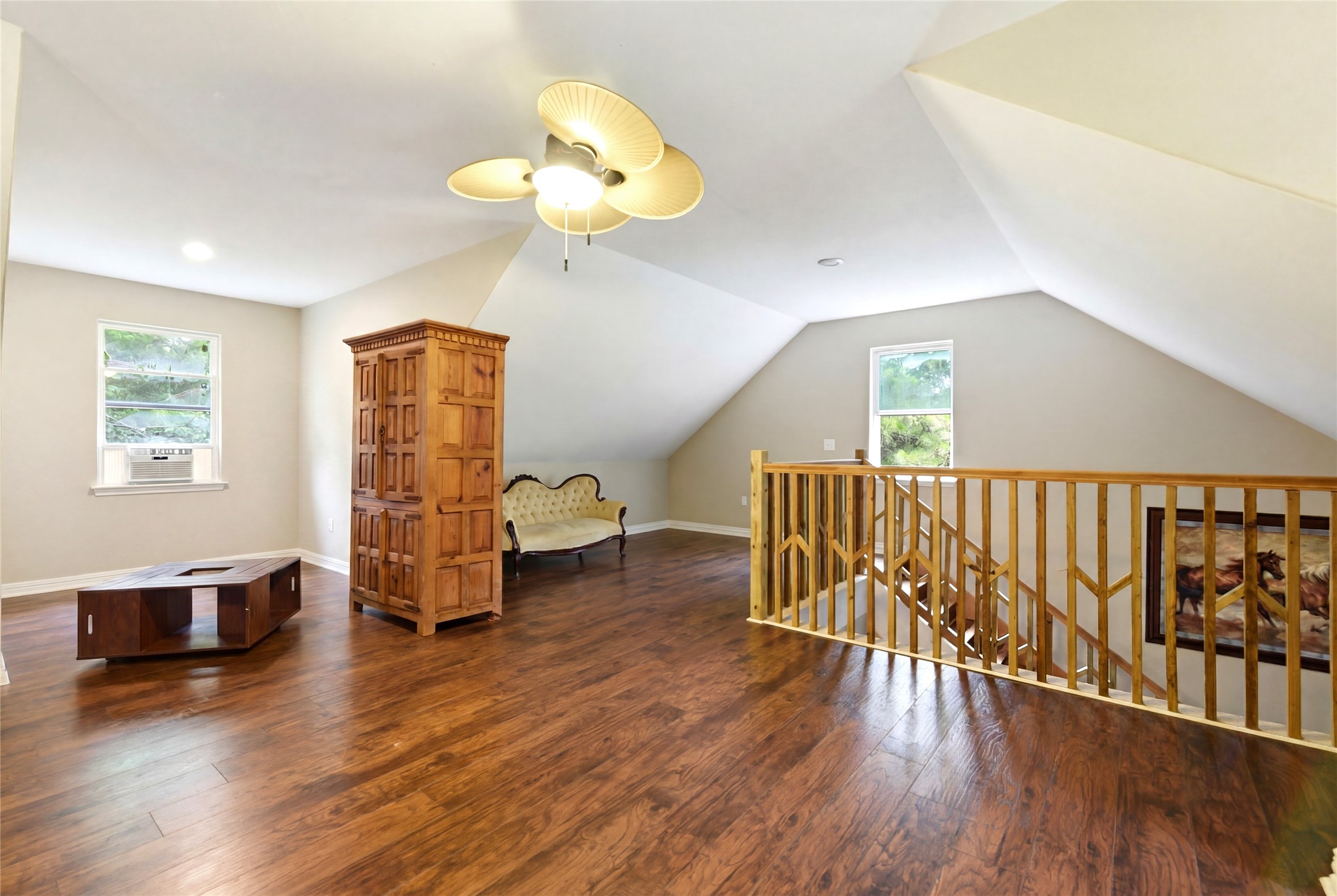 1151 County Line Road Shepherd, TX 77371 - Photo 31 of 48 extra space, table, wardrobe, sofa, windows to back yard, stairs