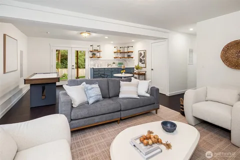 a bathroom with a sink mirror toilet and shower