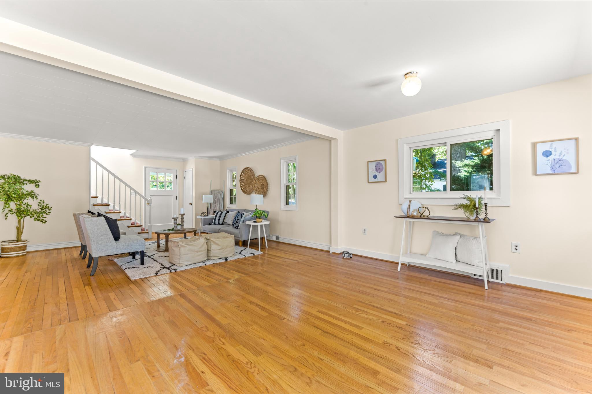 2926 Placid Avenue Baltimore, MD 21234 - Photo 11 of 37 a living room with furniture and a wooden floor