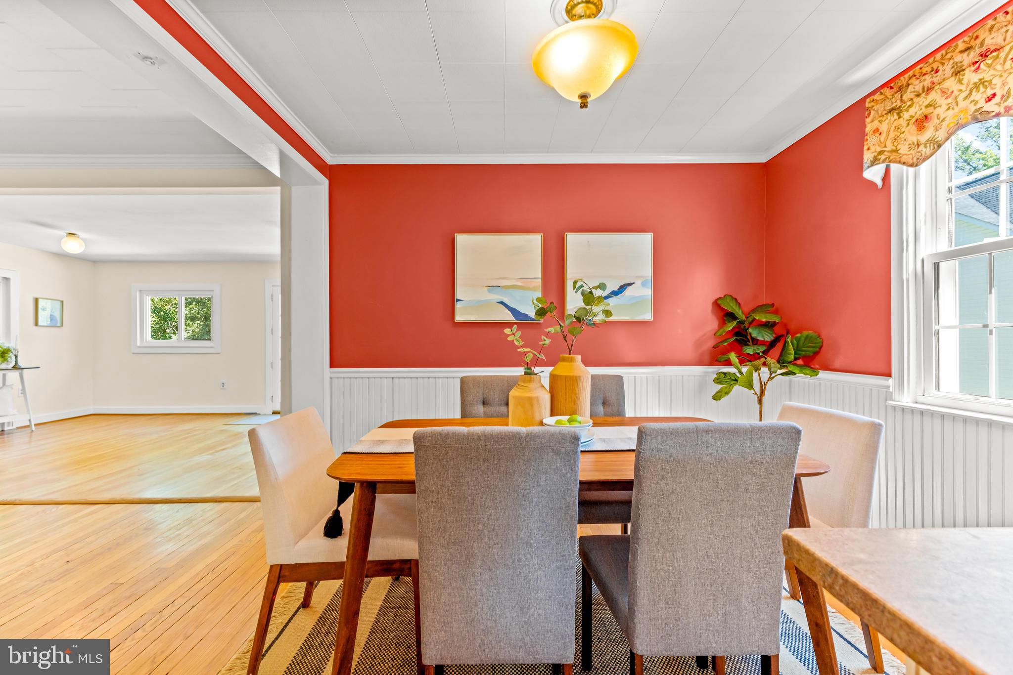 2926 Placid Avenue Baltimore, MD 21234 - Photo 16 of 37 a dining room with furniture and wooden floor