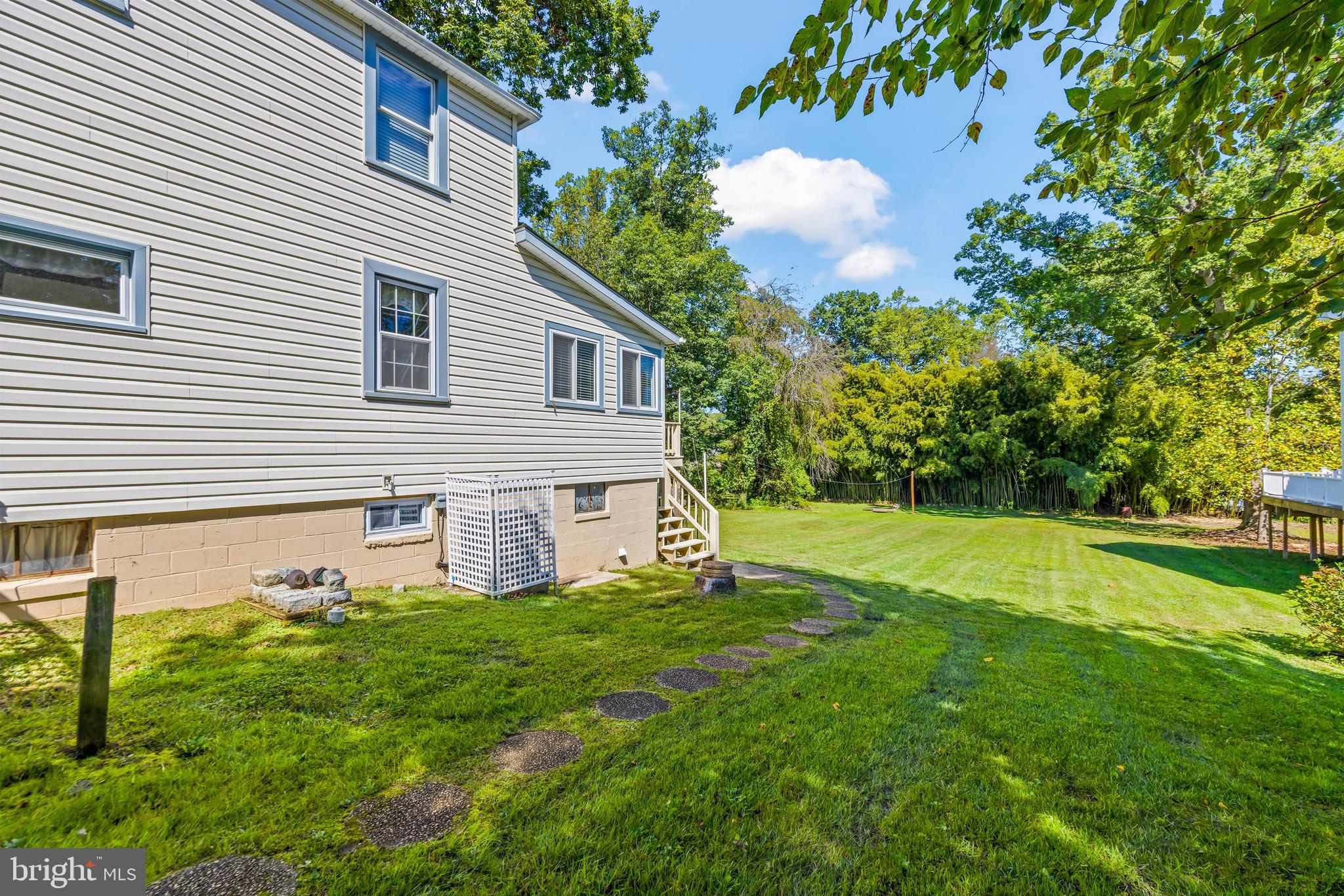 2926 Placid Avenue Baltimore, MD 21234 - Photo 33 of 37 a view of a house with a yard