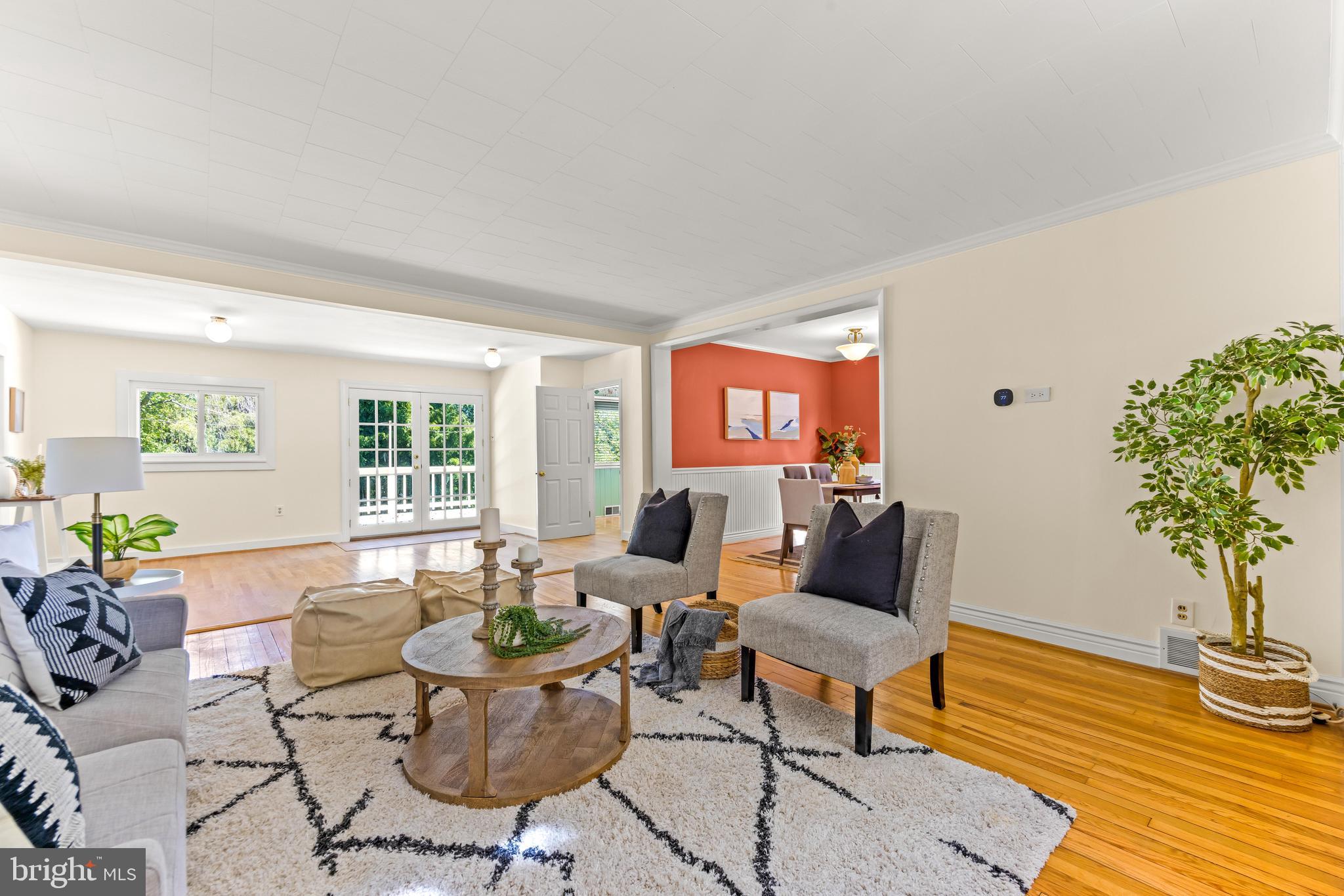 2926 Placid Avenue Baltimore, MD 21234 - Photo 7 of 37 a living room with furniture and a potted plant
