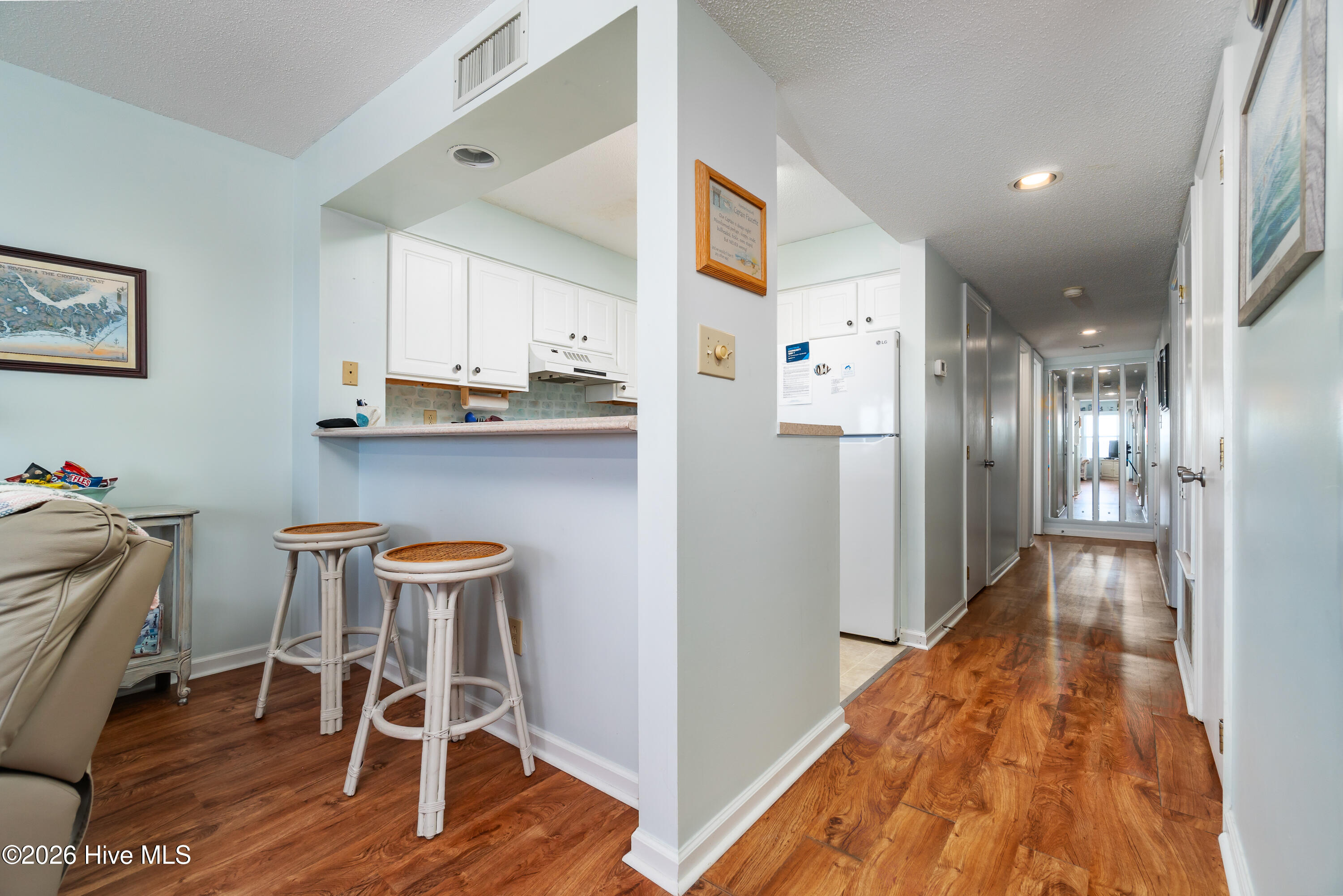 1010 Salter Path Road, Unit 33 Indian Beach, NC 28512 - Photo 15 of 52 Kitchen & Hallway View