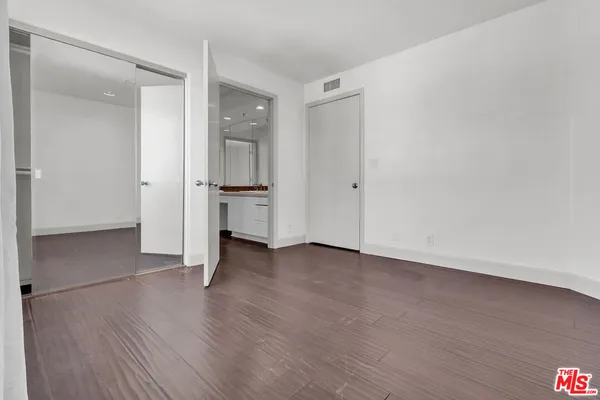 a bathroom with a bathtub and a sink