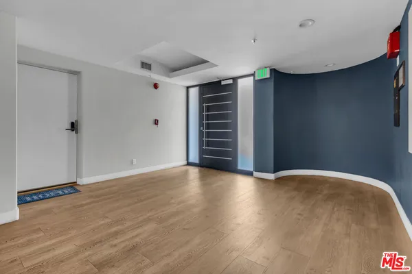 a view of multiple houses with a street