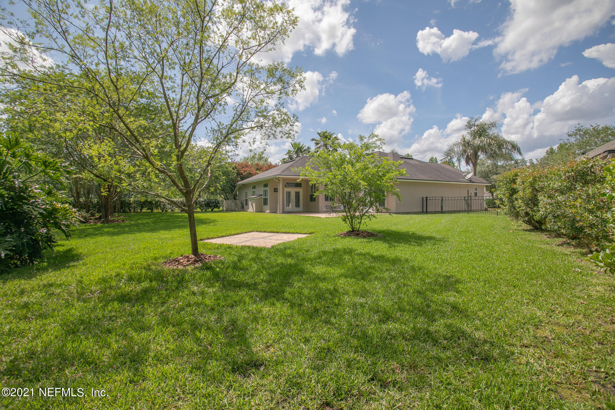 1277 Ribbon Road St. Johns, FL 32259 - Photo 33 of 44 a view of a house with a backyard and tree s