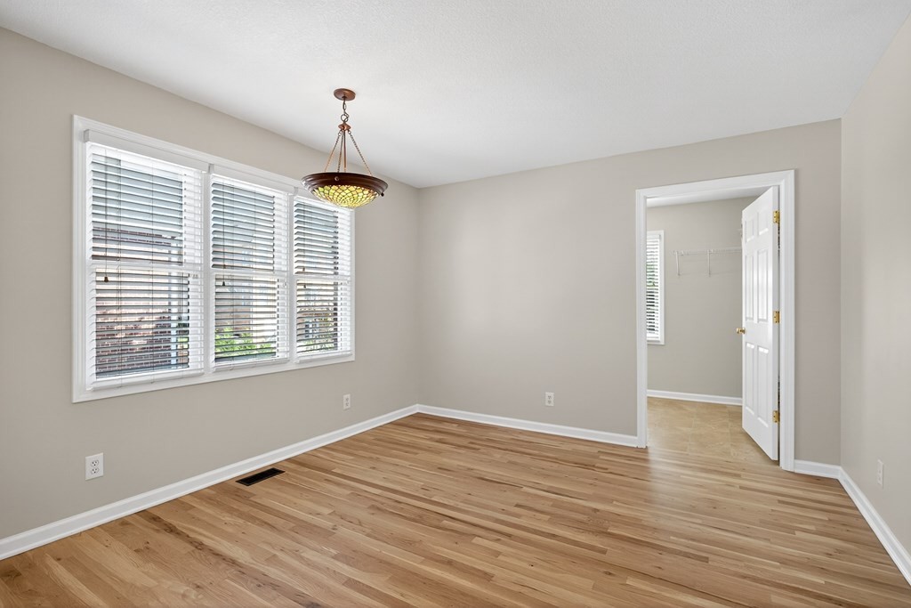 1325 Bridle Path Cookeville, TN 38501 - Photo 15 of 41 a big room with wooden floor a chandelier and windows