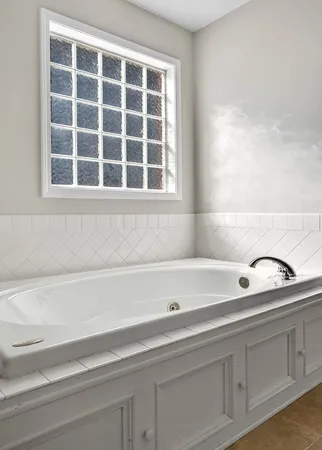 a bathroom with a sink and a bathtub