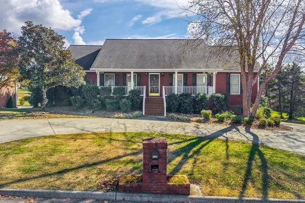 a view of a house with swimming pool