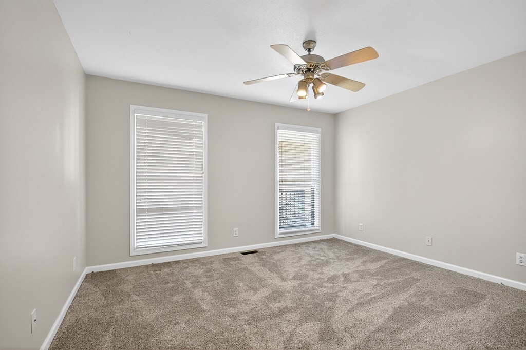 1325 Bridle Path Cookeville, TN 38501 - Photo 24 of 41 an empty room with windows and fan
