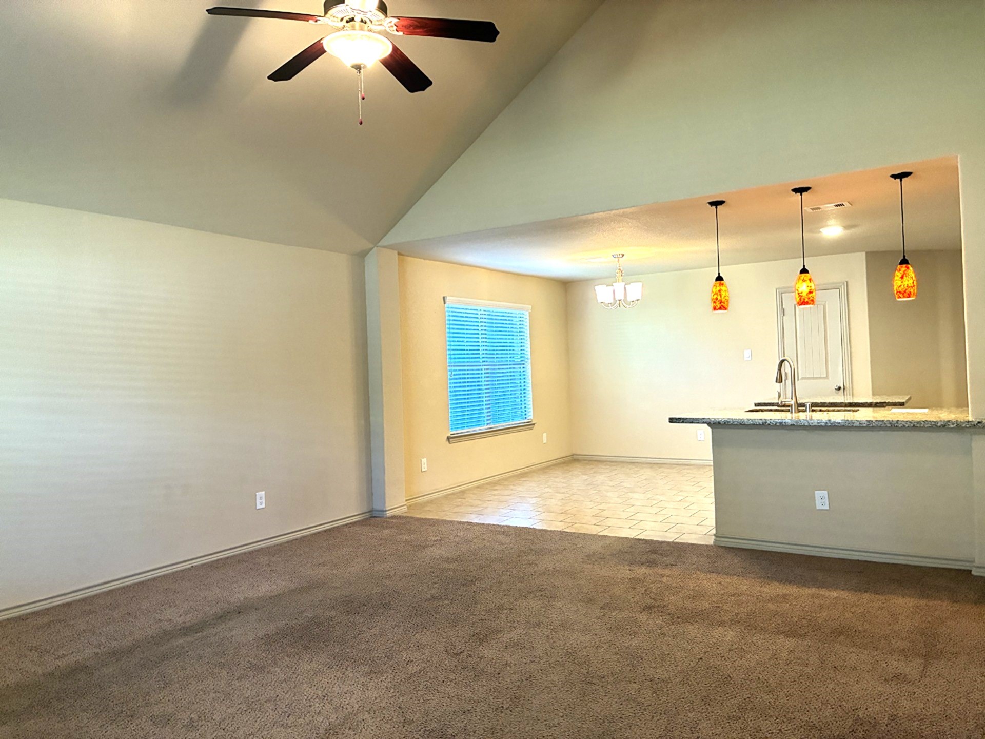 19063 Painted Boulevard Porter, TX 77365 - Photo 13 of 23 an empty room with a ceiling fan and window