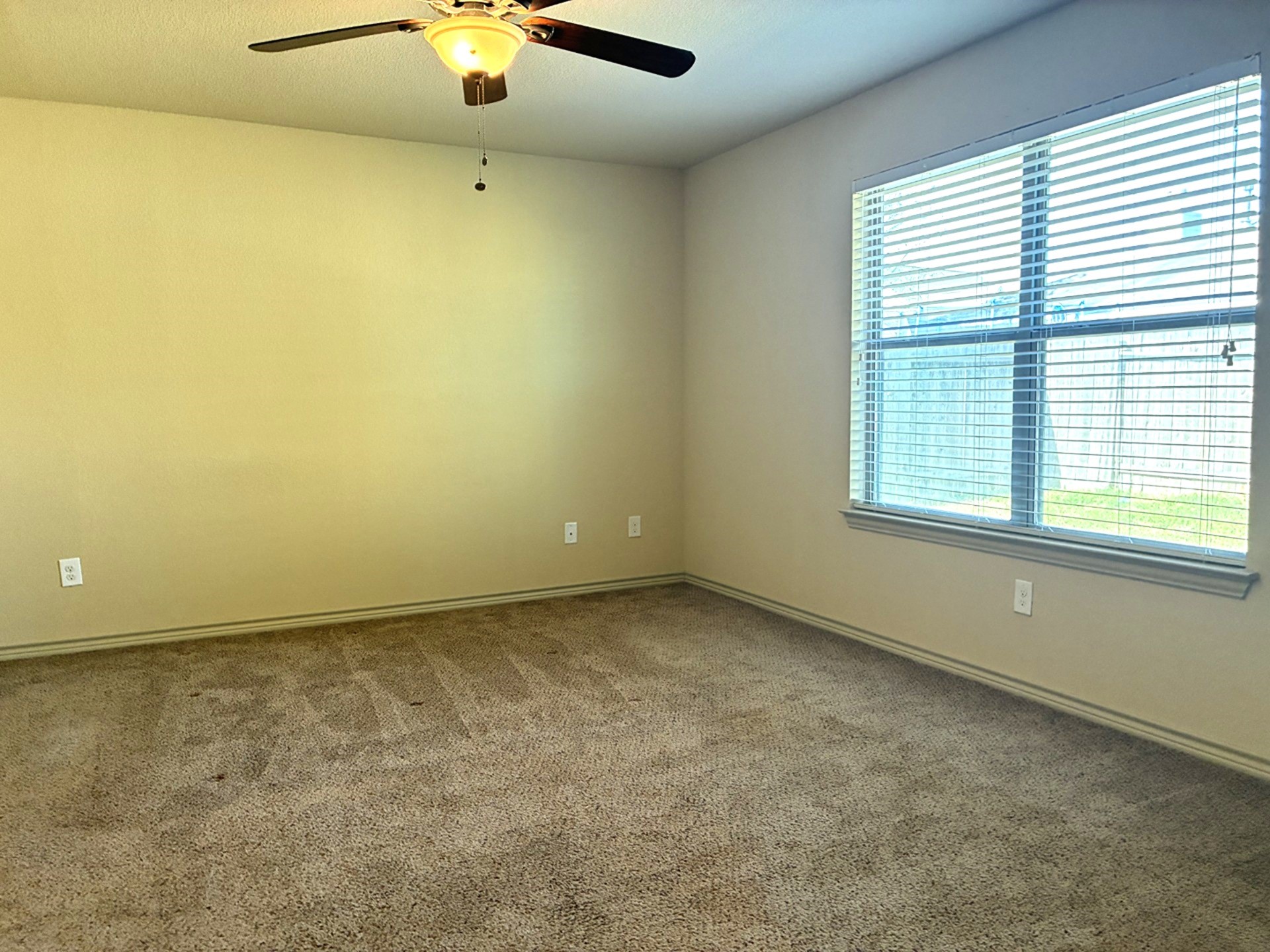 19063 Painted Boulevard Porter, TX 77365 - Photo 15 of 23 a view of an empty room with a window