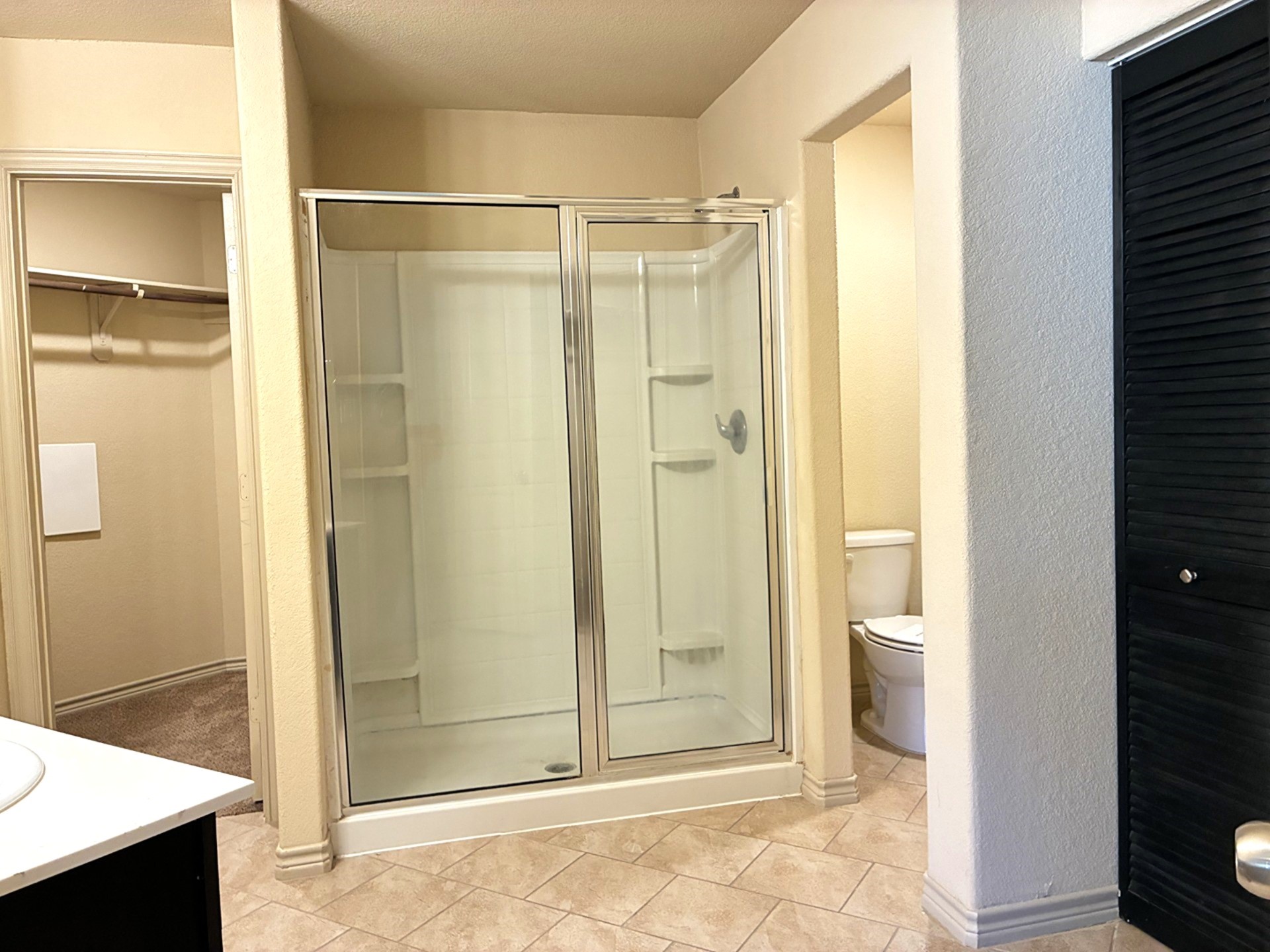 19063 Painted Boulevard Porter, TX 77365 - Photo 16 of 23 a bathroom with a shower and a glass door