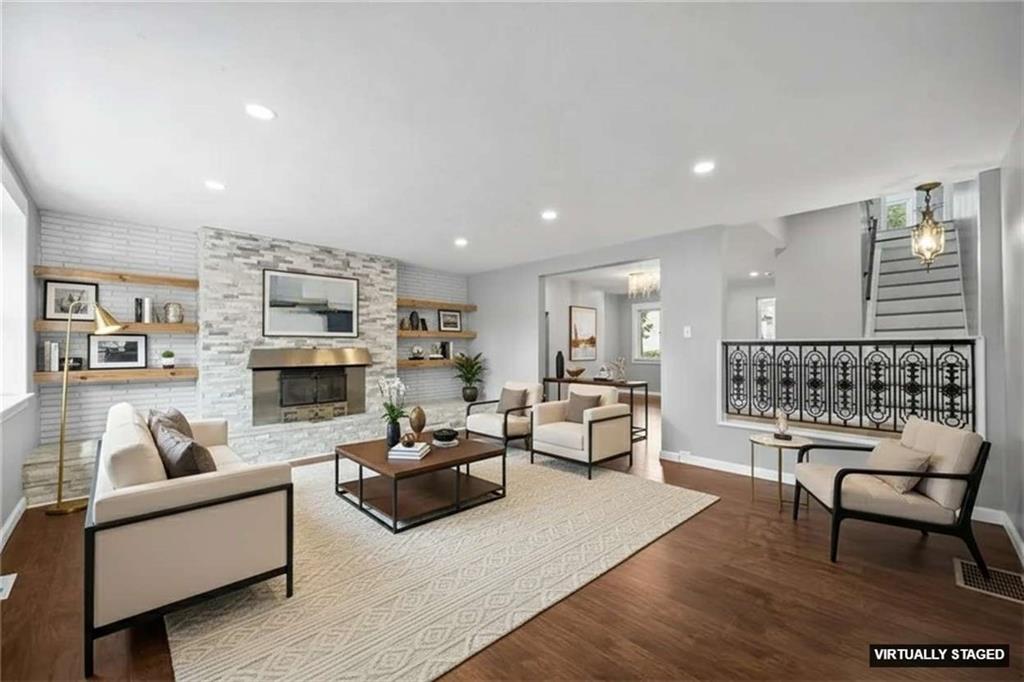 3943 Howley Street Pittsburgh, PA 15224 - Photo 2 of 32 a living room with furniture and a fireplace
