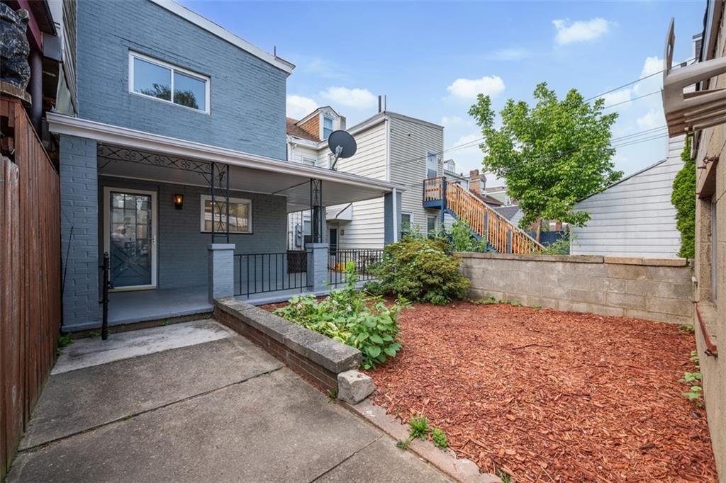 3943 Howley Street Pittsburgh, PA 15224 - Photo 26 of 32 a front view of a house with garden