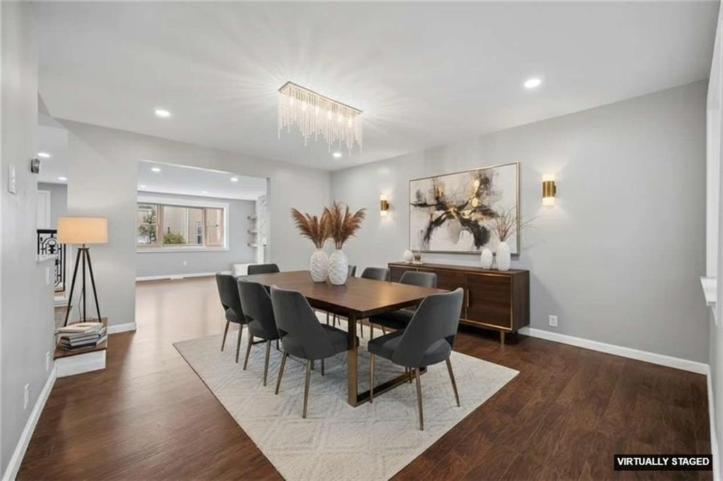 3943 Howley Street Pittsburgh, PA 15224 - Photo 3 of 32 a view of a dining room with furniture and wooden floor